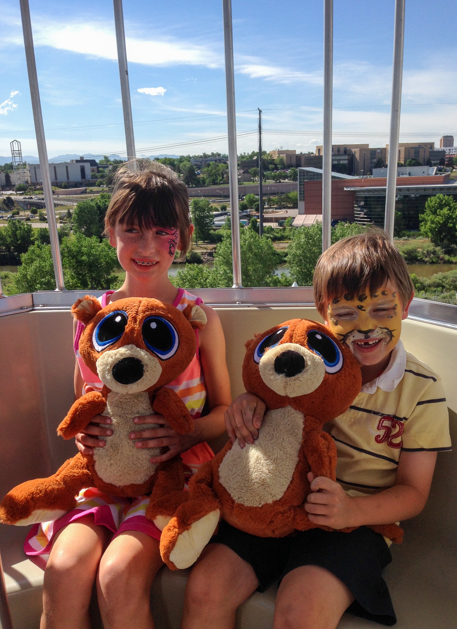 Kids with their Elitch Gardens carnival prizes