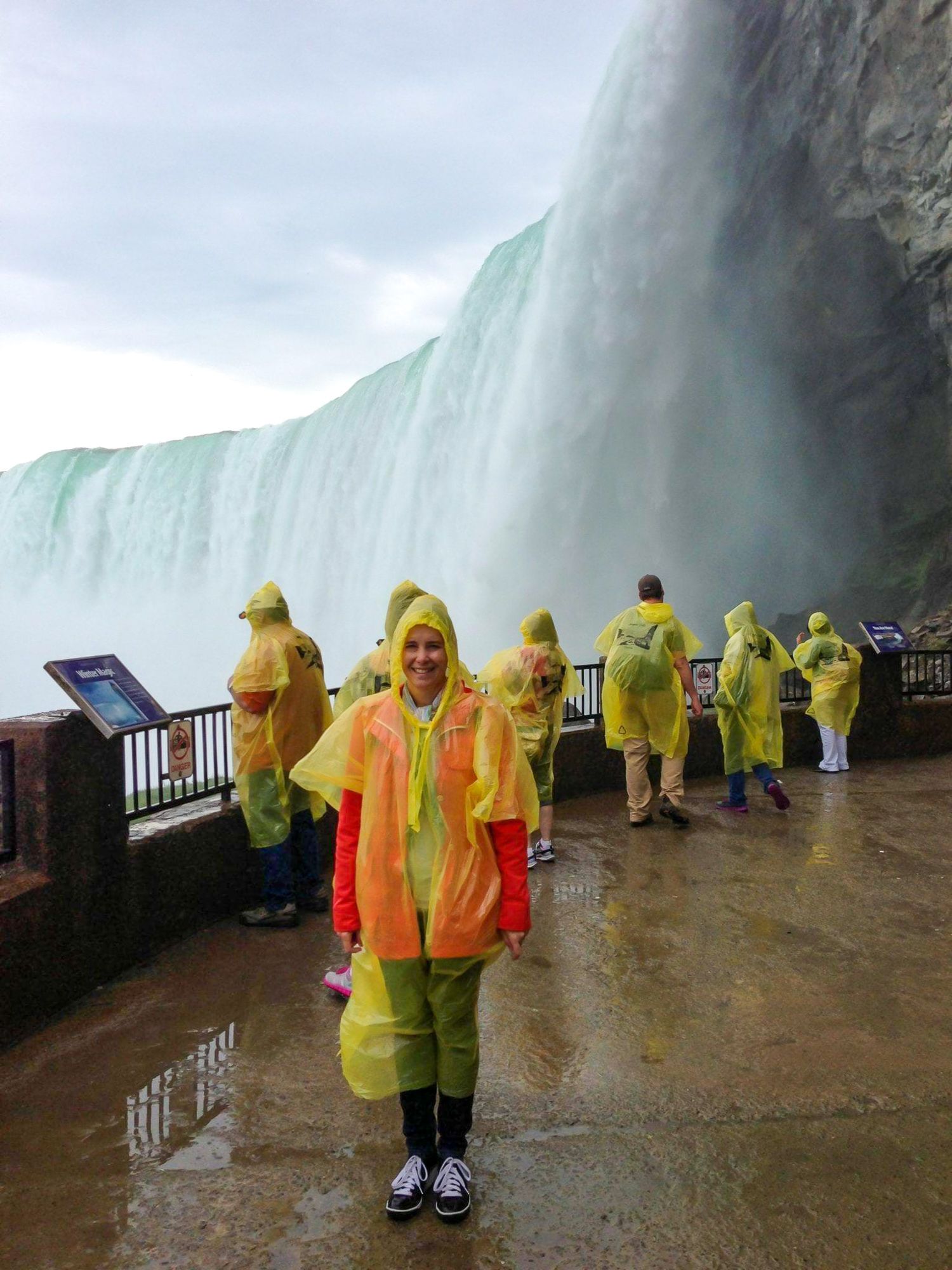 Me in my sleek yellow poncho at Journey Behind the Falls