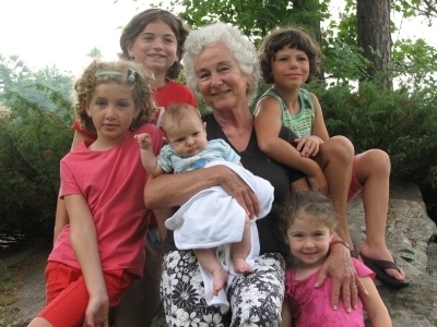 CARES Inventor Louise Stoll with five of her grandchildren (Photo credit: CARES by Kids Fly Safe)