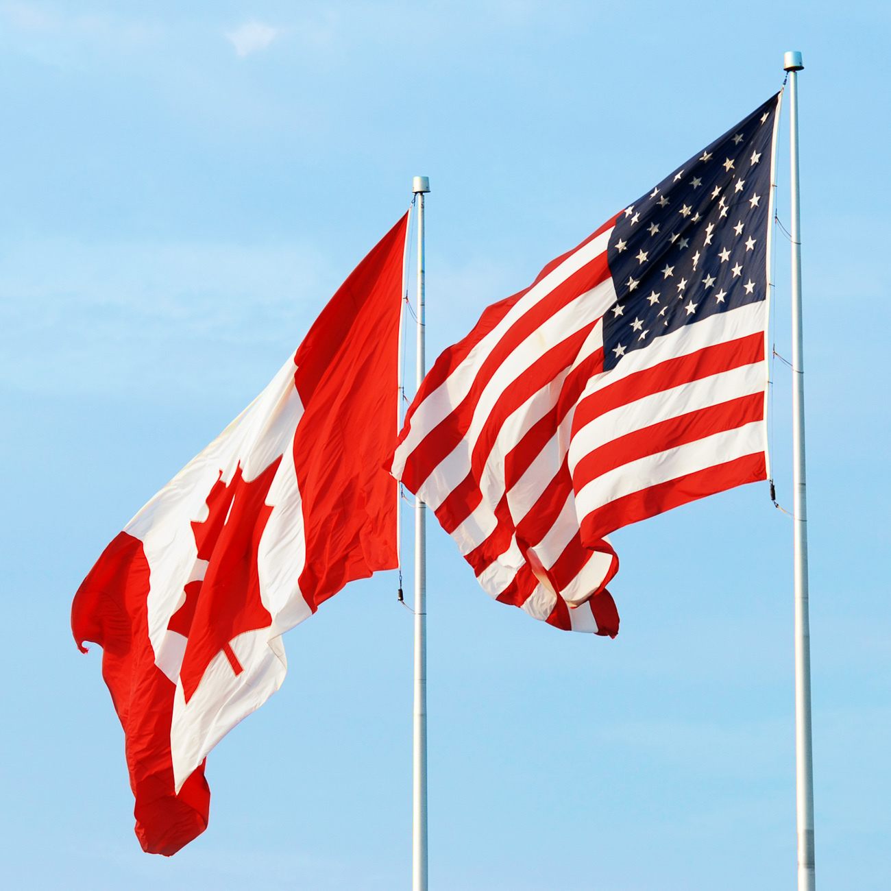 Canadian and American flags side by side