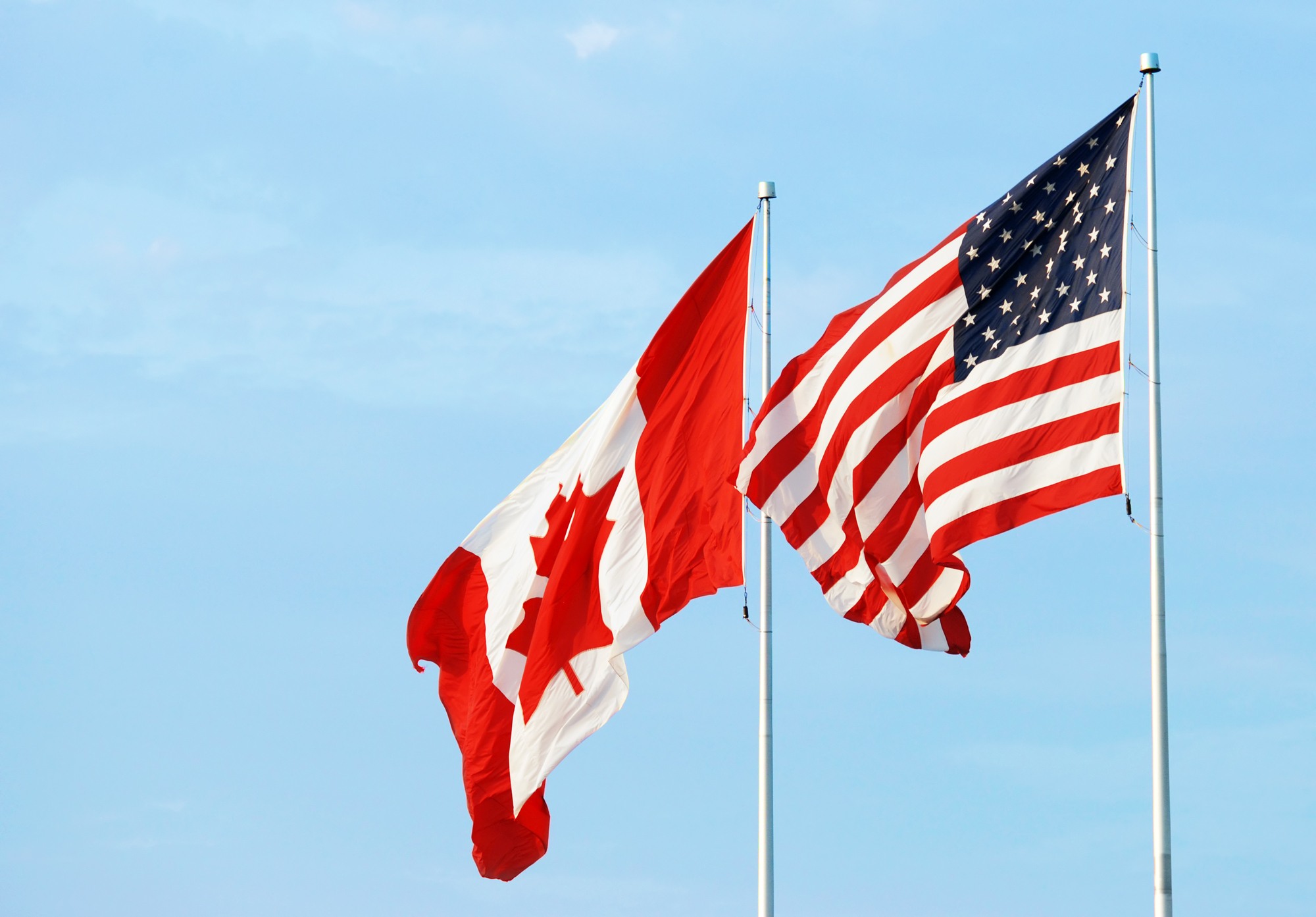 Canadian and American flags together