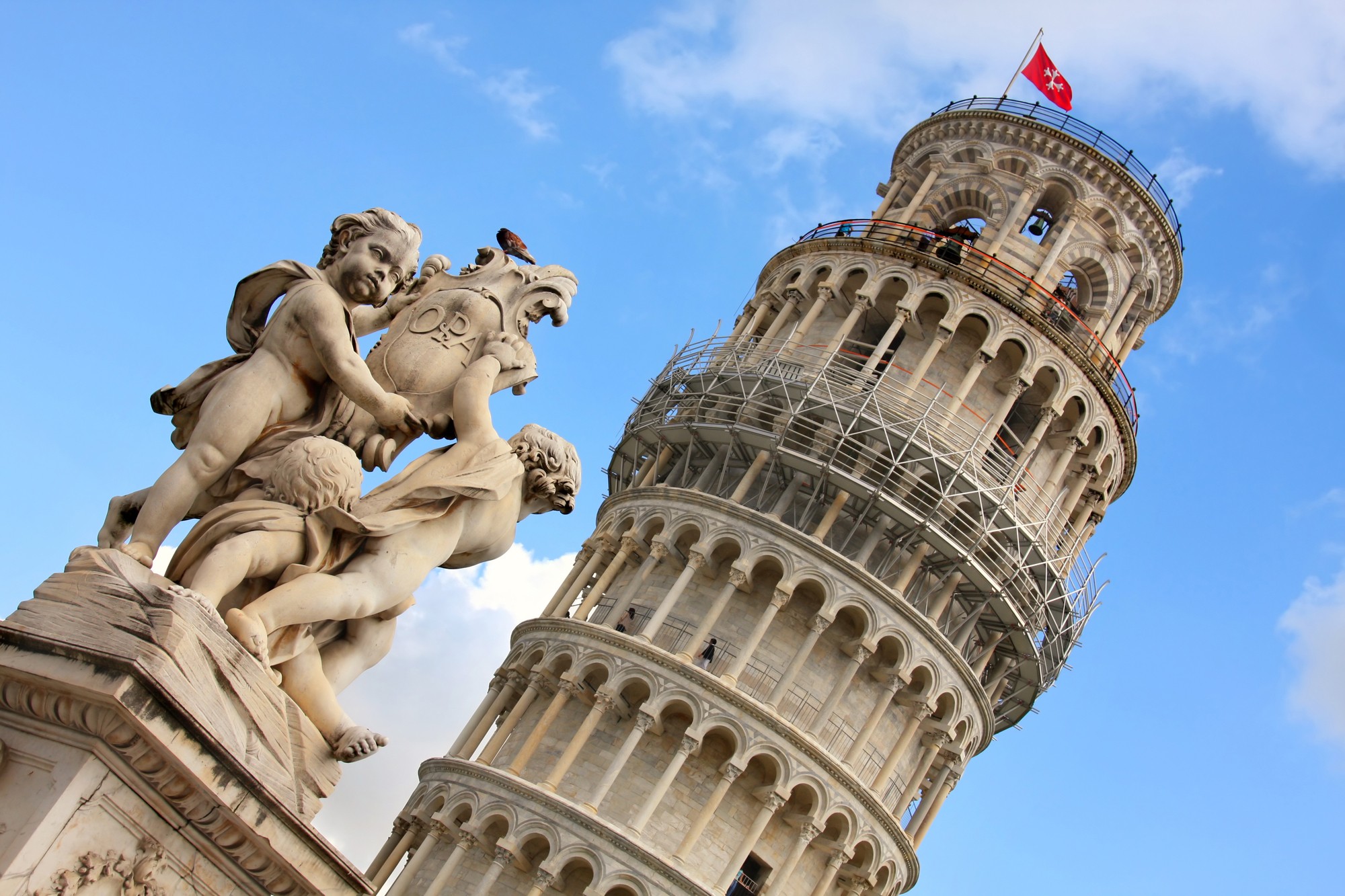 Leaning Tower and angel statue in Pisa 