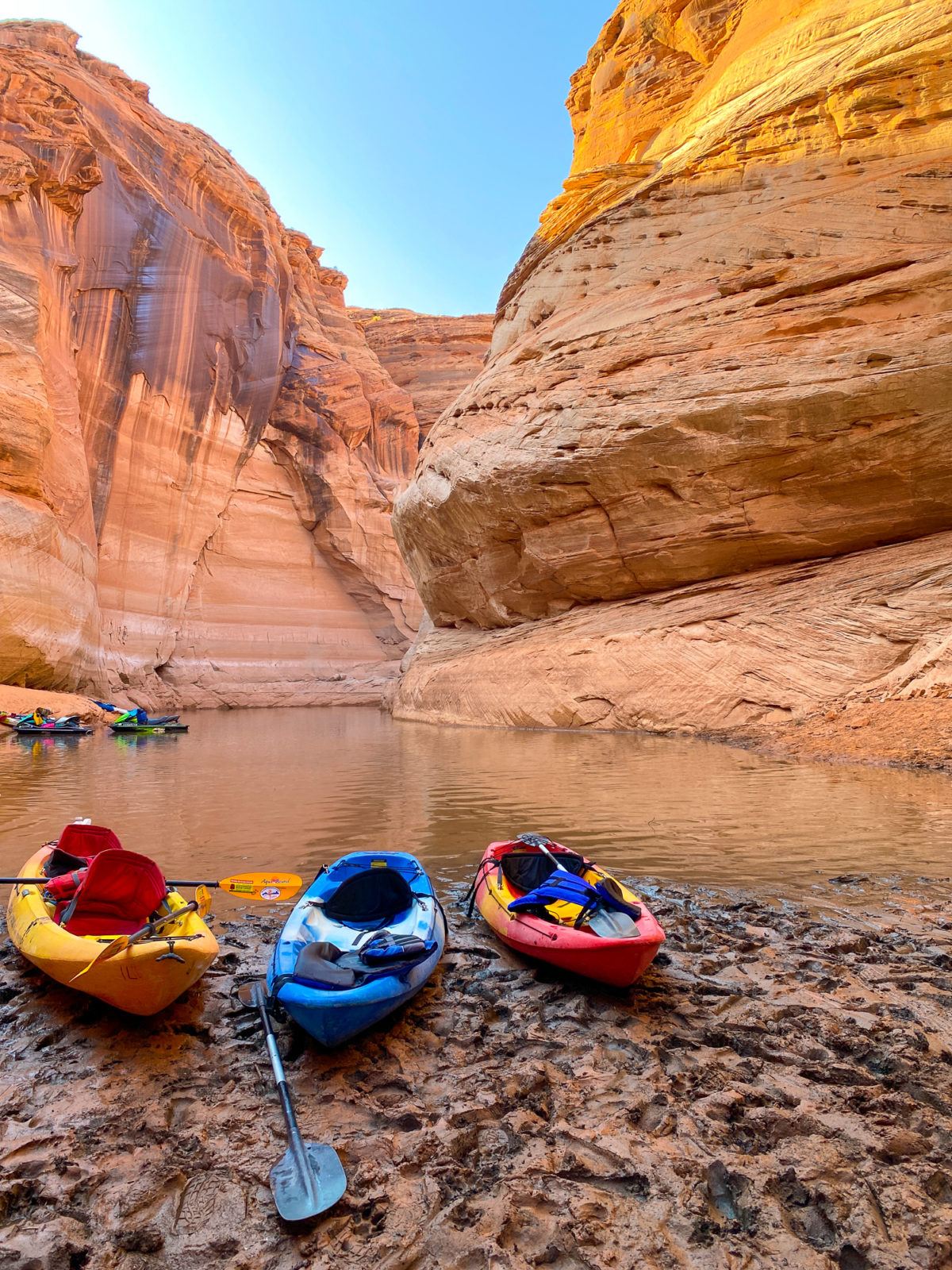 Kayaks docked on the shore of Lake Powell in Antelope Canyon 