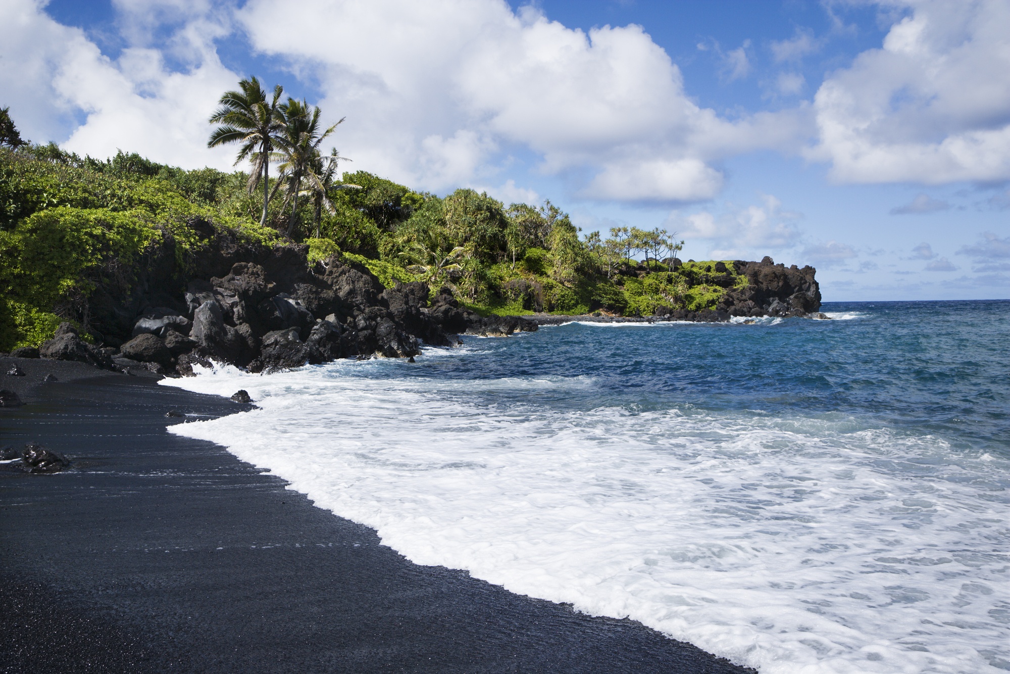 Black sand beach in Western state Maui, Hawaii 