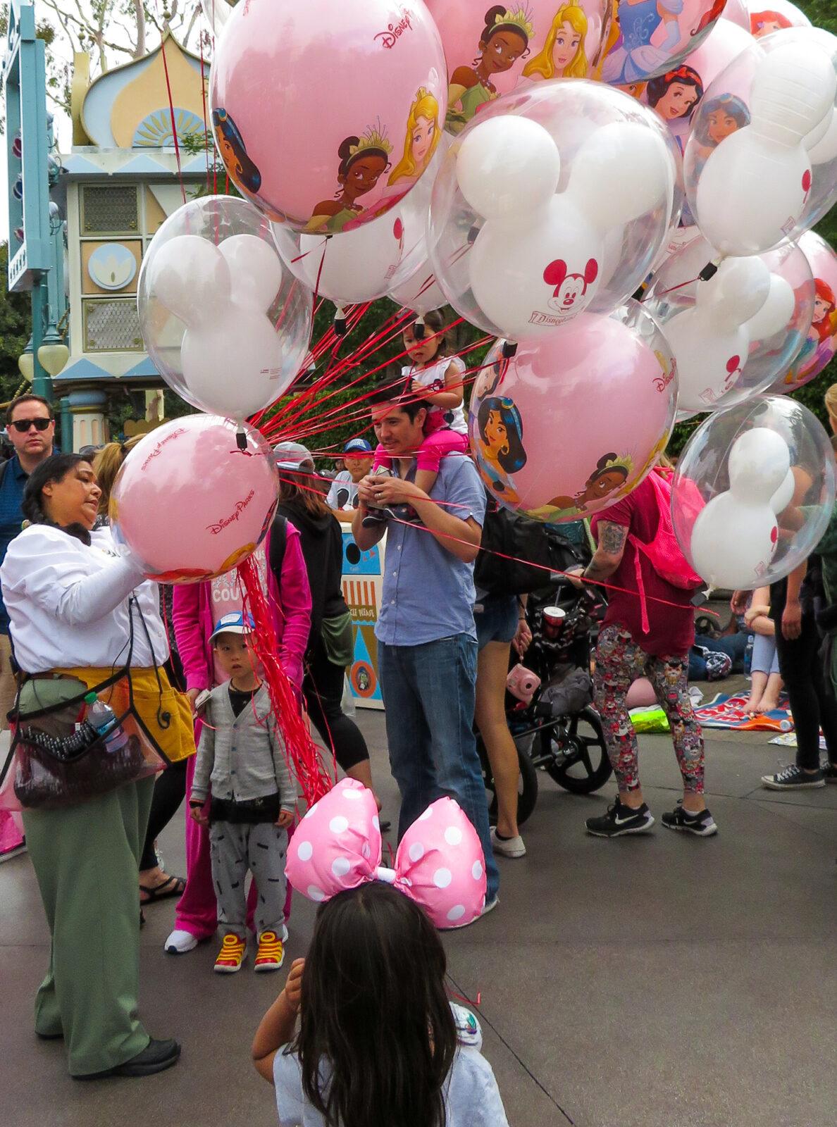 Balloons for sale at Disneyland with kids