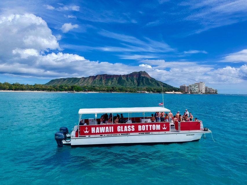 Hawaii Glass Bottom Boat Tour in Oahu with kids with Diamond Head in the background