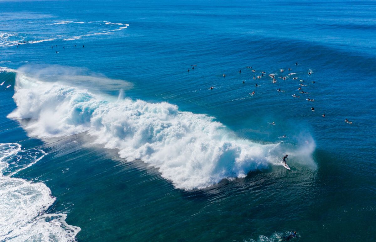 Surfers on the North Shore of Oahu