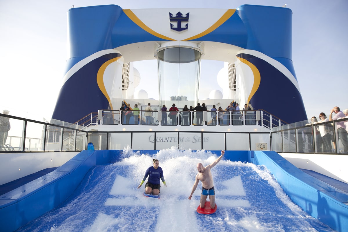 Couple on FlowRider on Quantum of the Seas