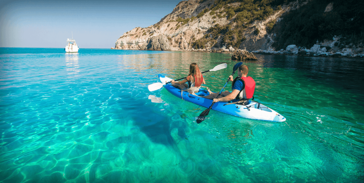 Couple on Royal Caribbean kayaking shore excursion in the Mediterranean