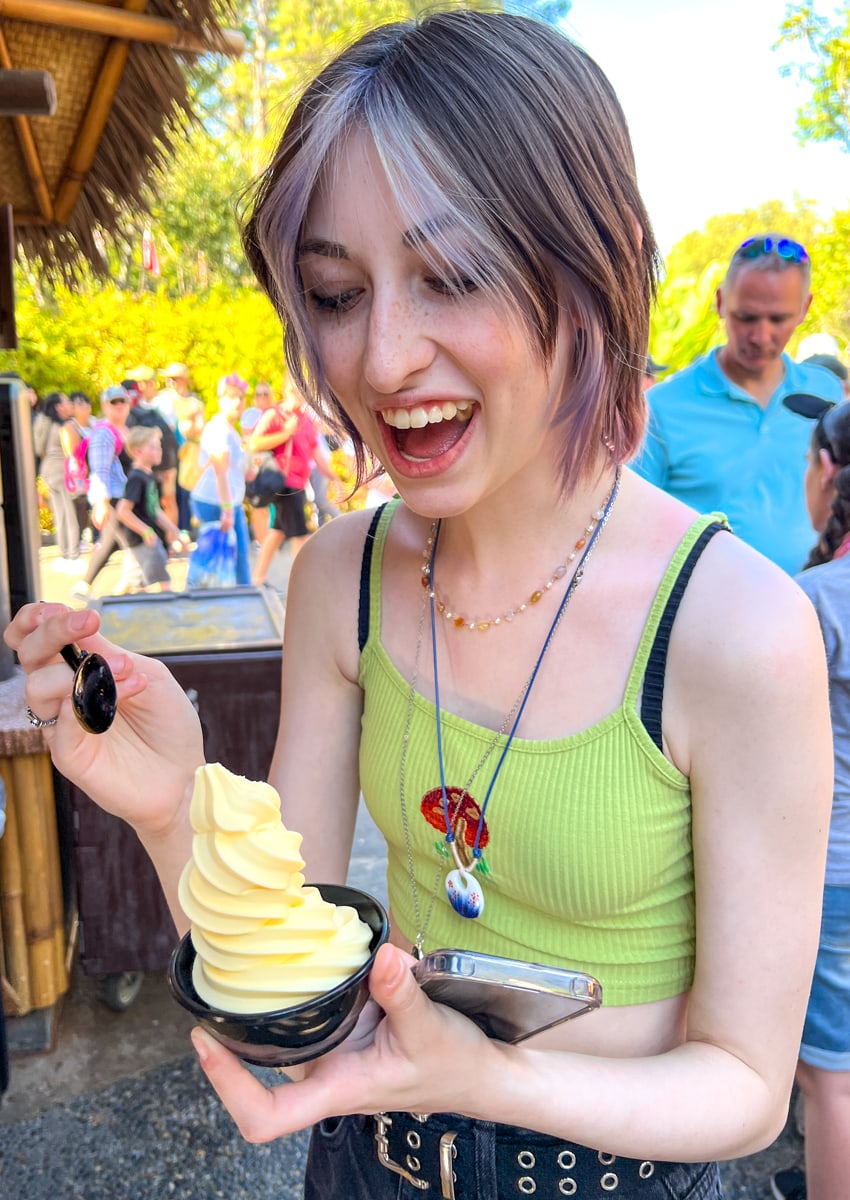 Teenager with Dole Whip at Disneyland