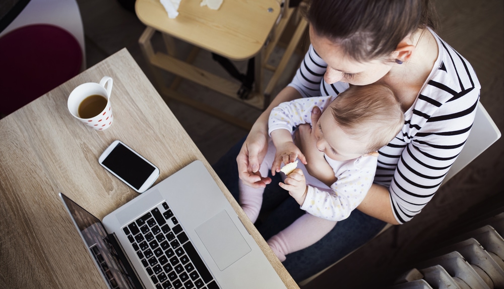 Mom and baby with computer