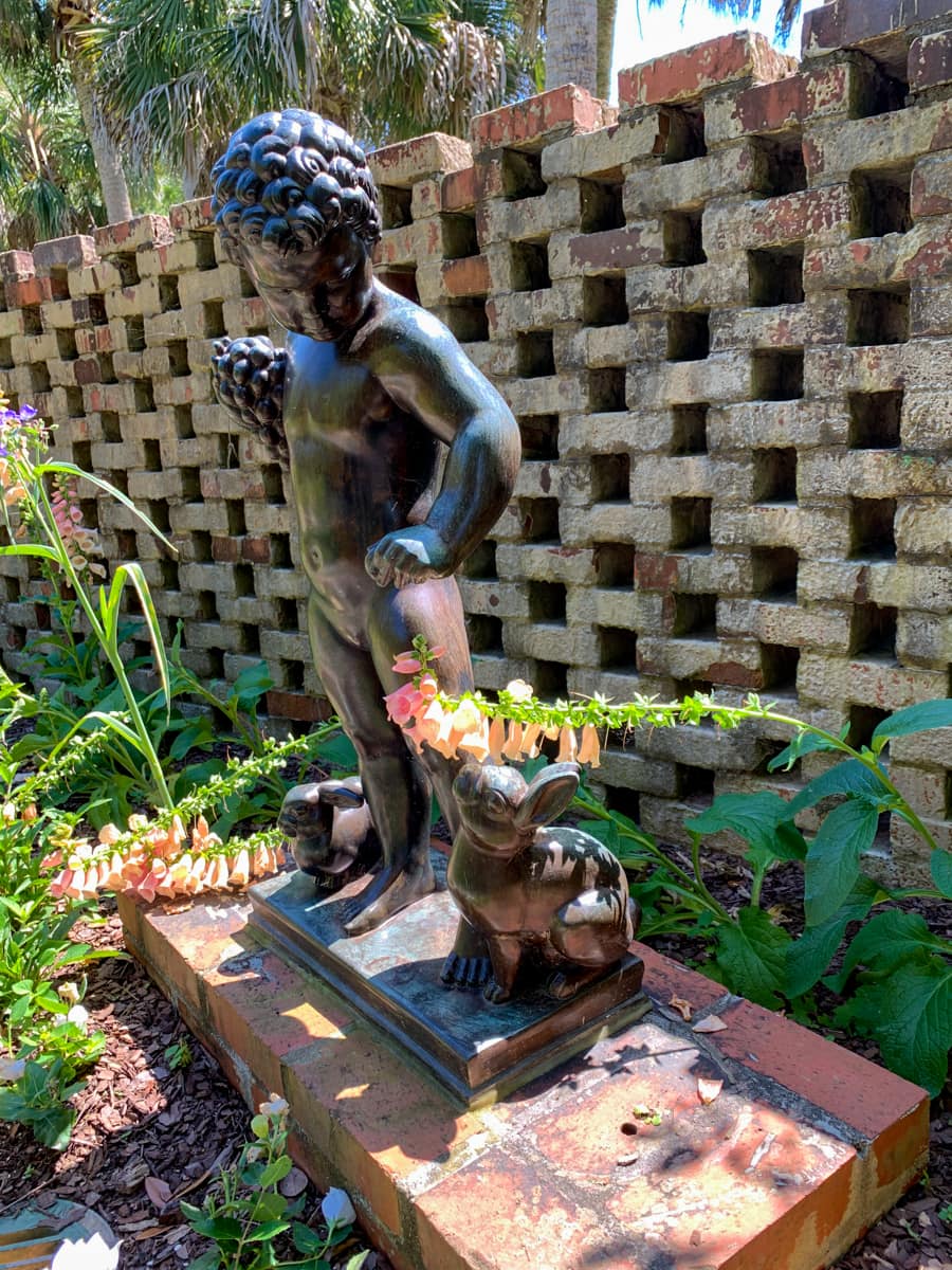 A little boy and bunny statue at Brookgreen Gardens