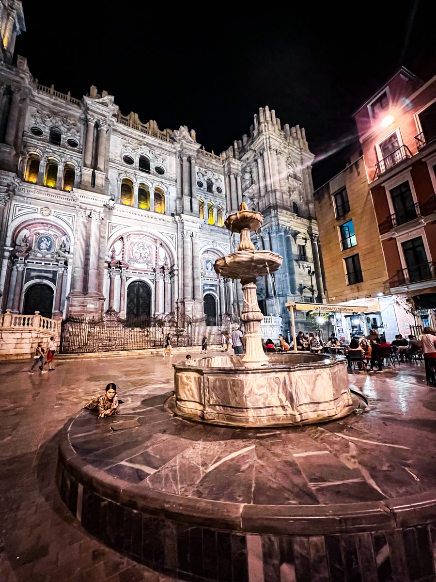 Plaza de la Constitución and Málaga Cathedral at night 