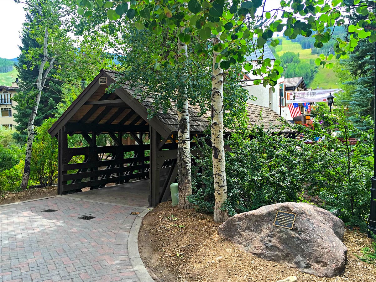 A covered bridge leads to Vail Village