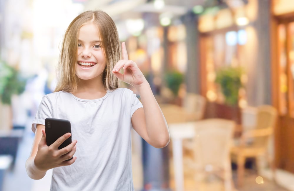 Older child contacting parent via smartphone