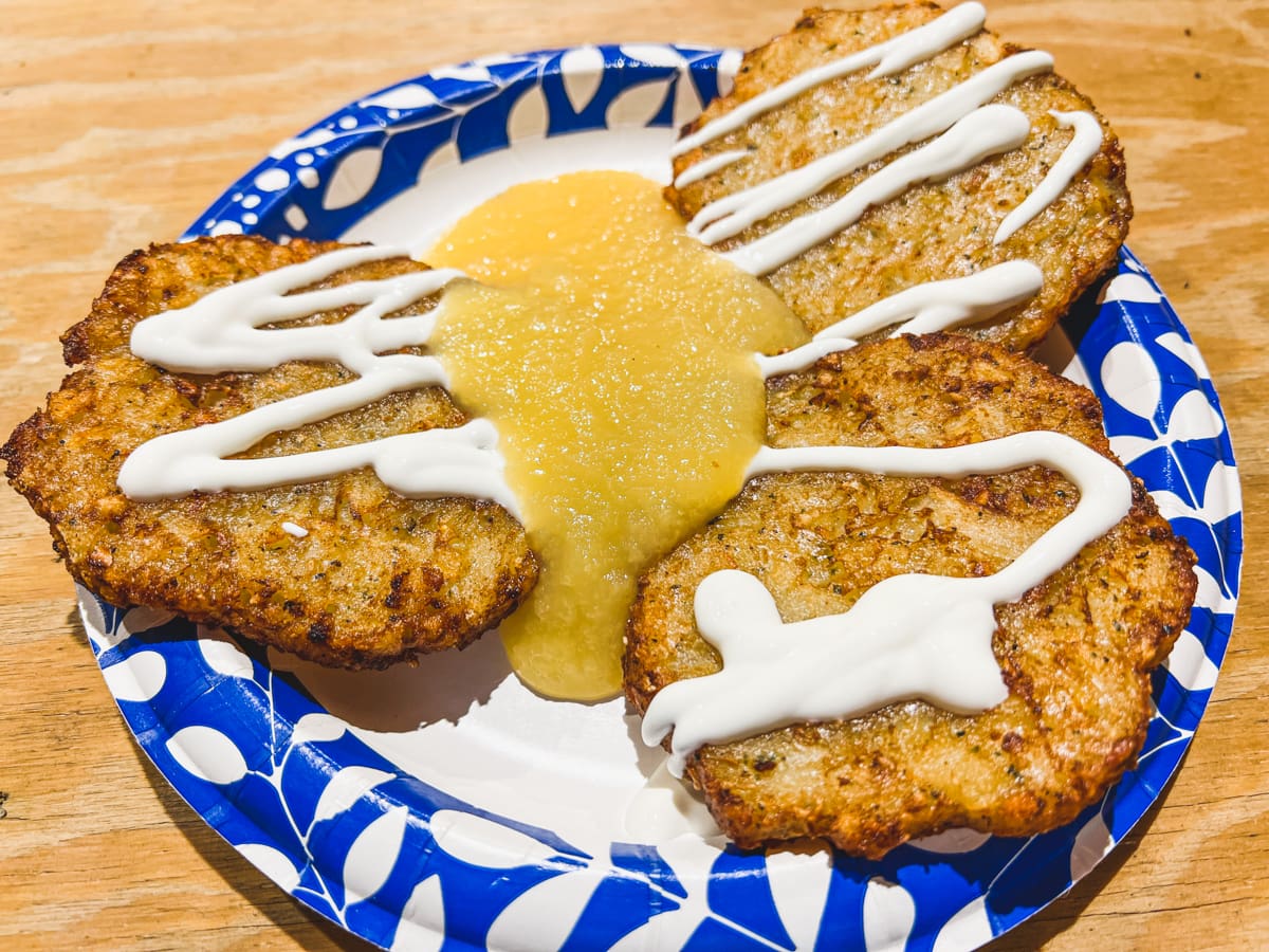 Potato latkes served with applesauce and sour cream to celebrate Hanukkah in Scottsdale