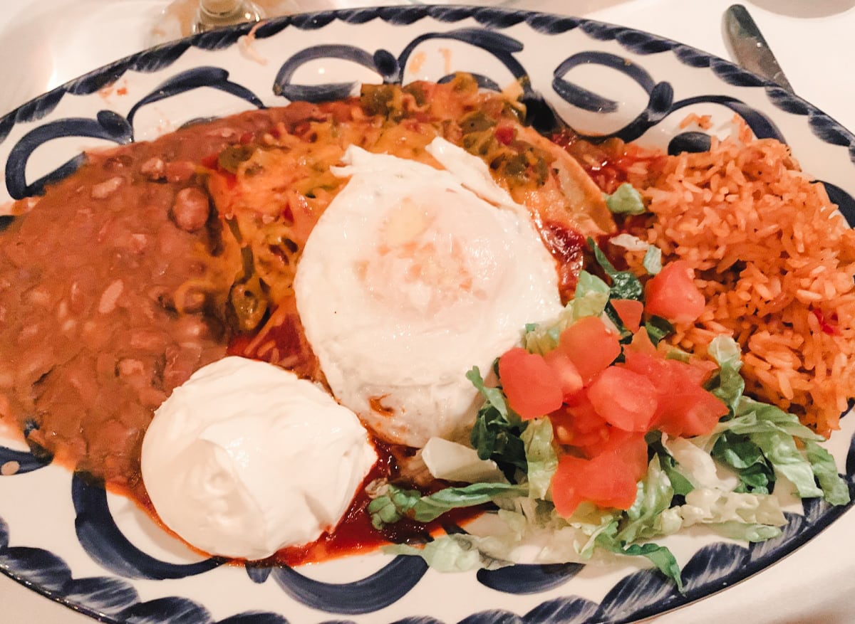 Farm-to-table enchiladas topped with a pasture-raised egg at El Pinto in Albuquerque, NM