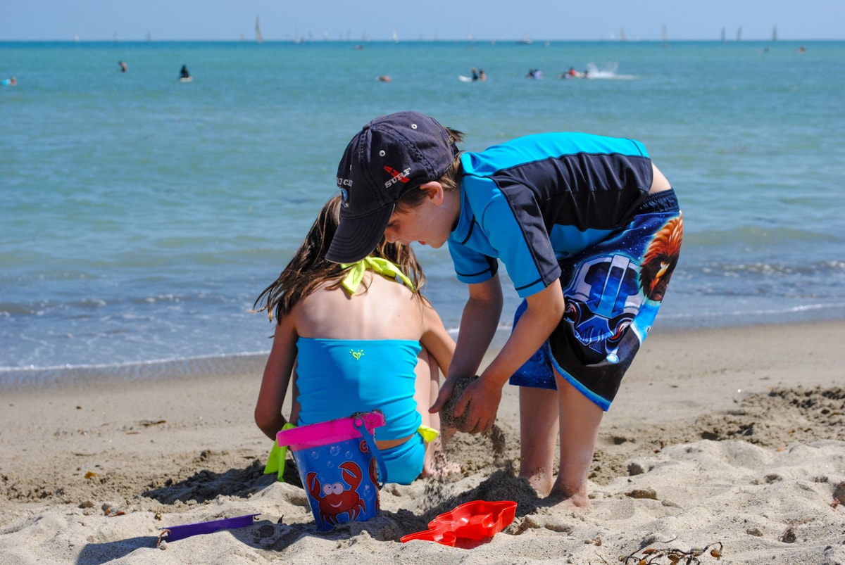 My kids playing in the sand at Doheny Beach in Dana Harbor