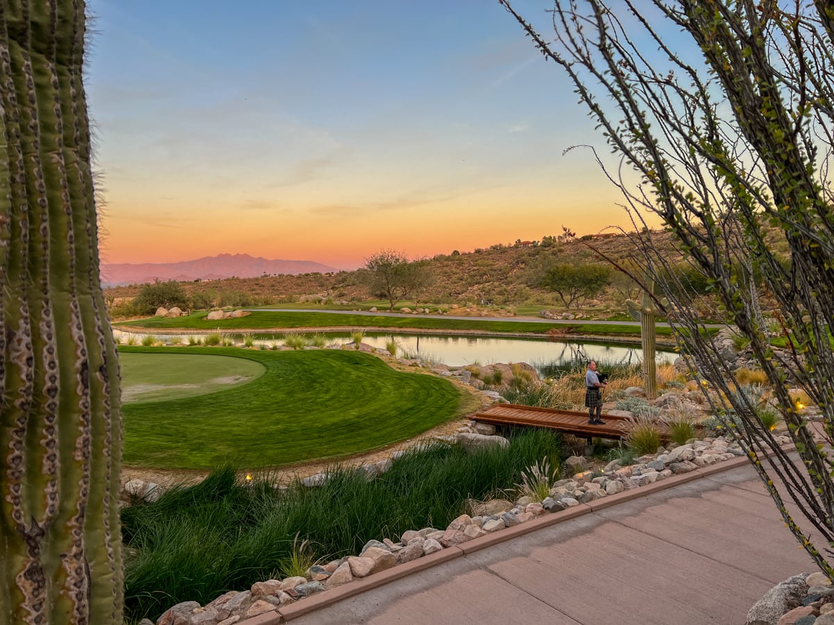 A bagpipe player welcoming sunset at Eagle Mountain Golf Club in Fountain Hills just south of Scottsdale 