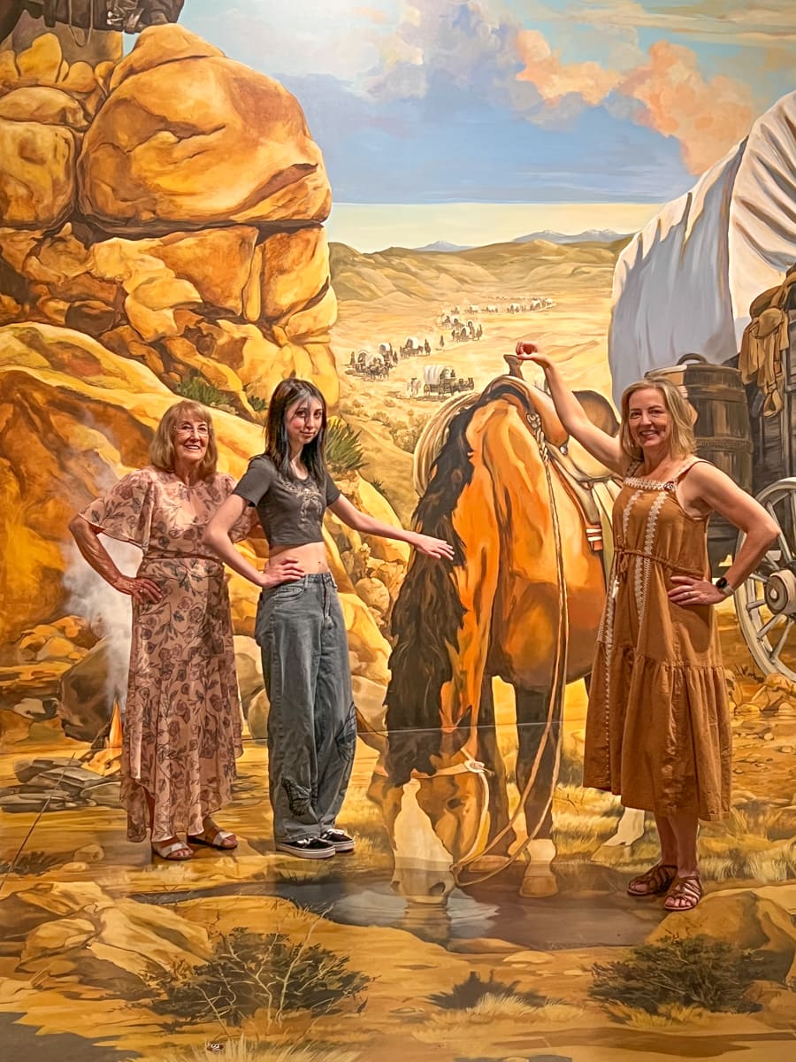 Three generations posing at Museum of the West 