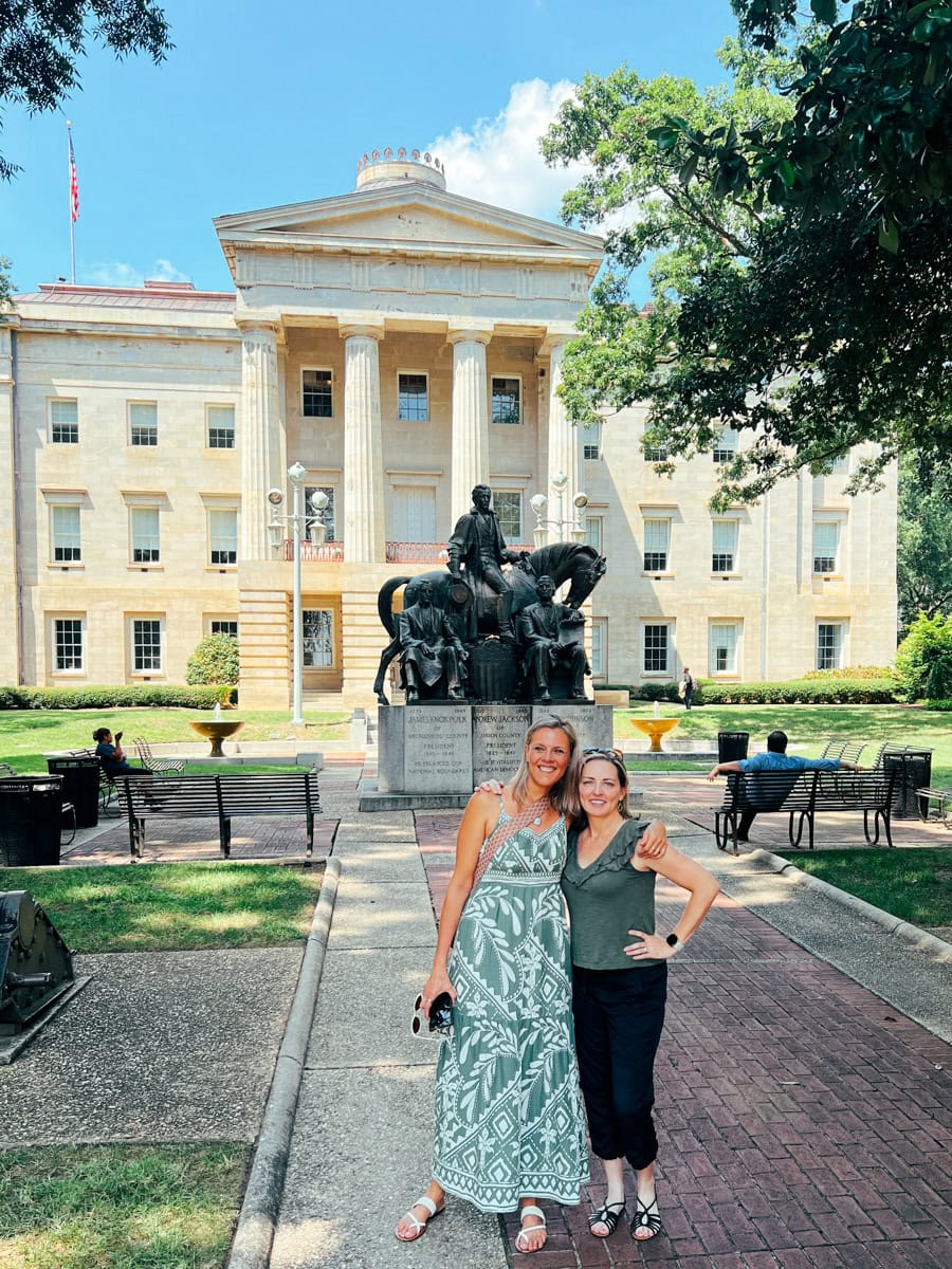 Adult friends at the North Carolina State Capitol in Raleigh