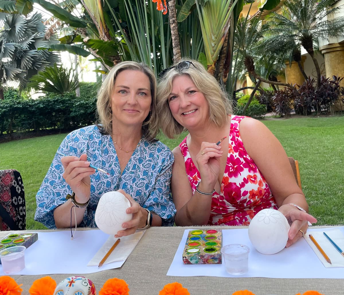 Travels Between With Colleen and her sister making Día de los Muertos craft at Velas Vallarta