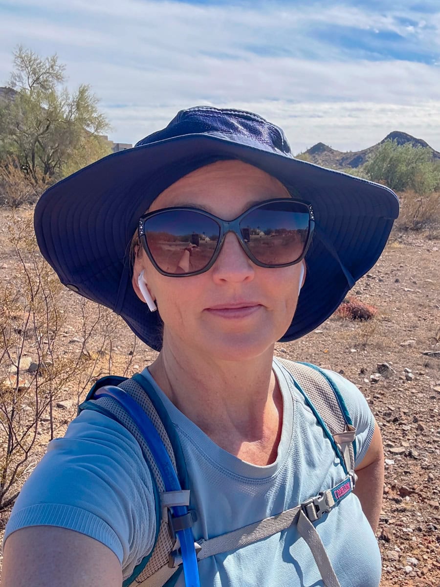 Travel Influencer Colleen Lanin wearing East Water Sun Hat