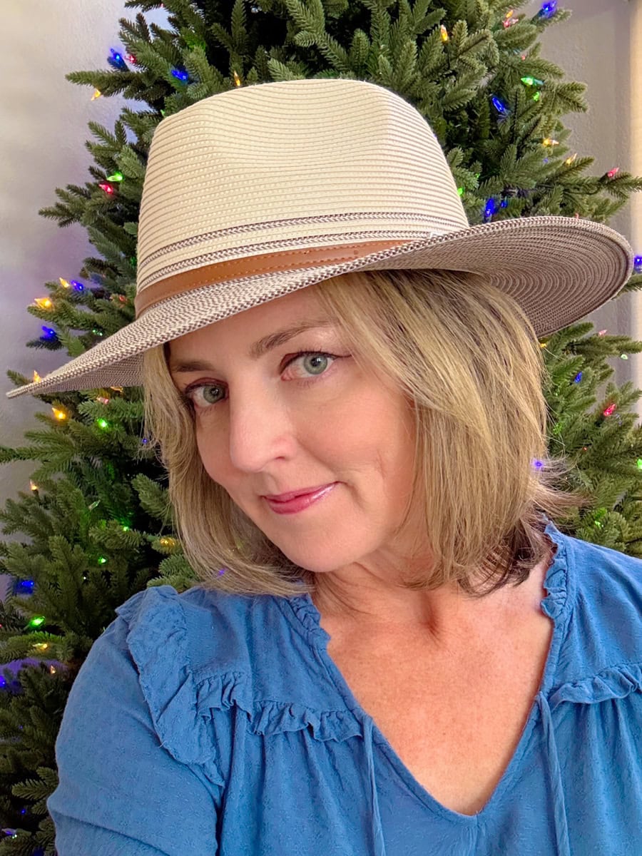 Travels Between With Colleen wearing hat by Wallaroo Hat Company