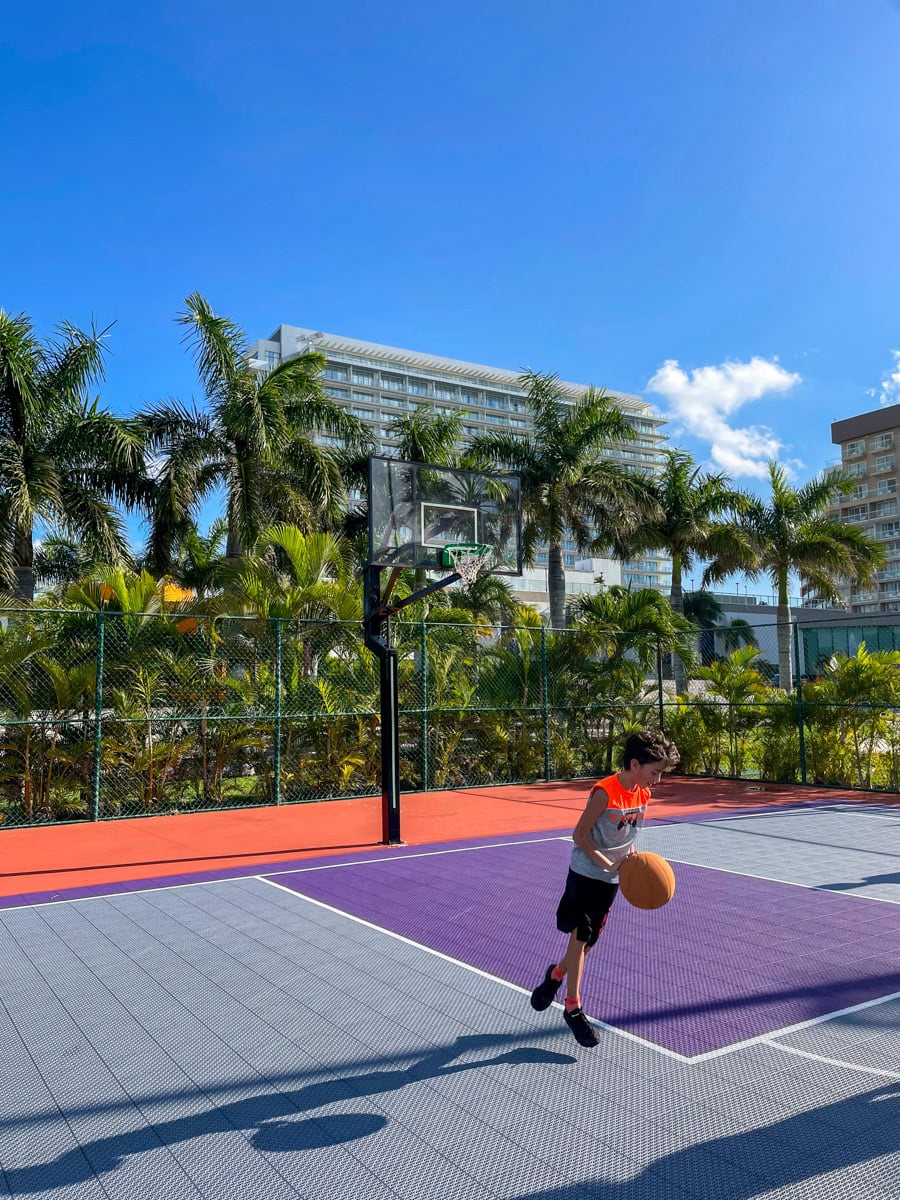 Boy playing basketball at Hard Rock Hotel Cancun