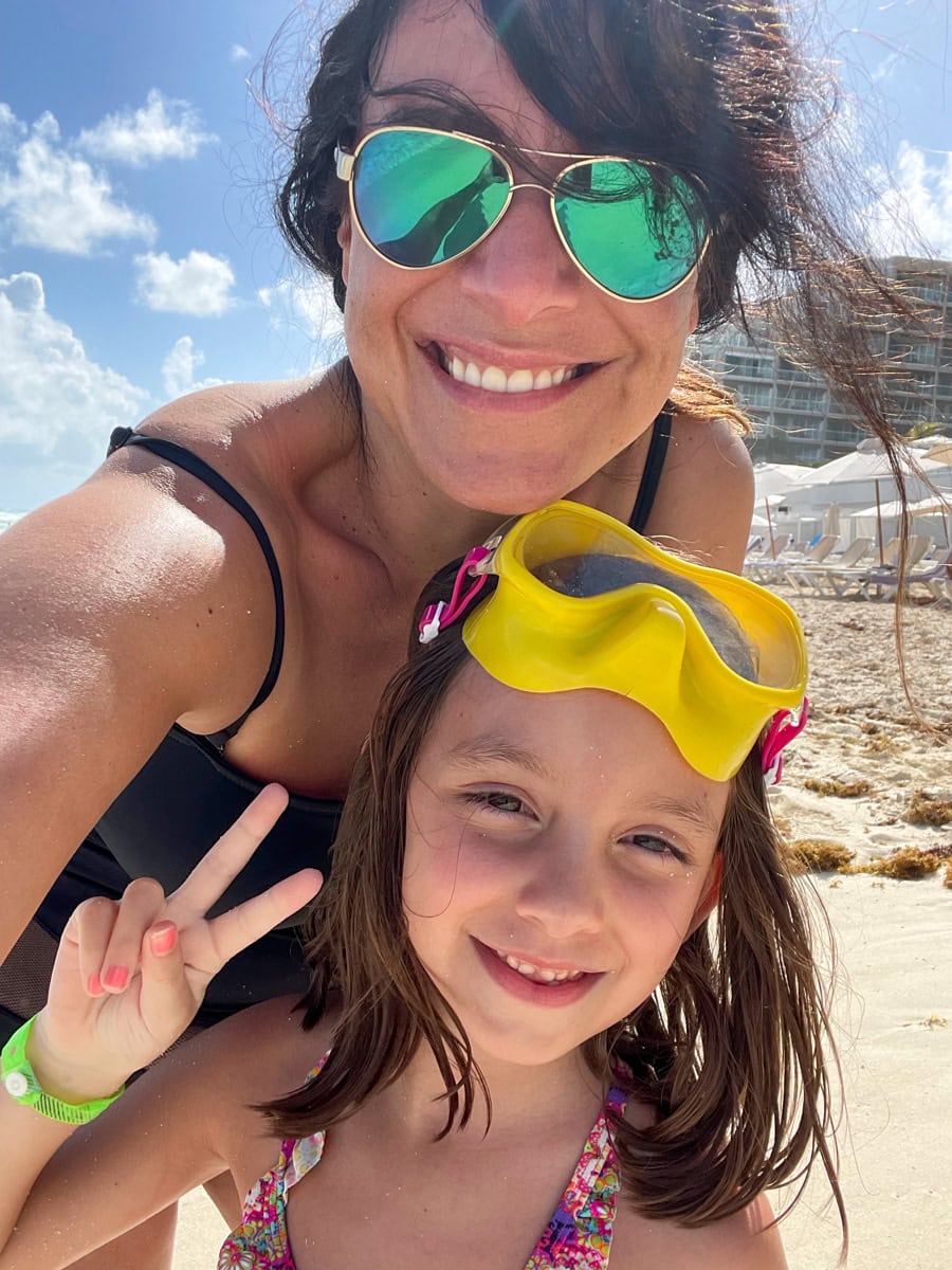 Cancun with kids - a mom and daughter on a Mexican beach