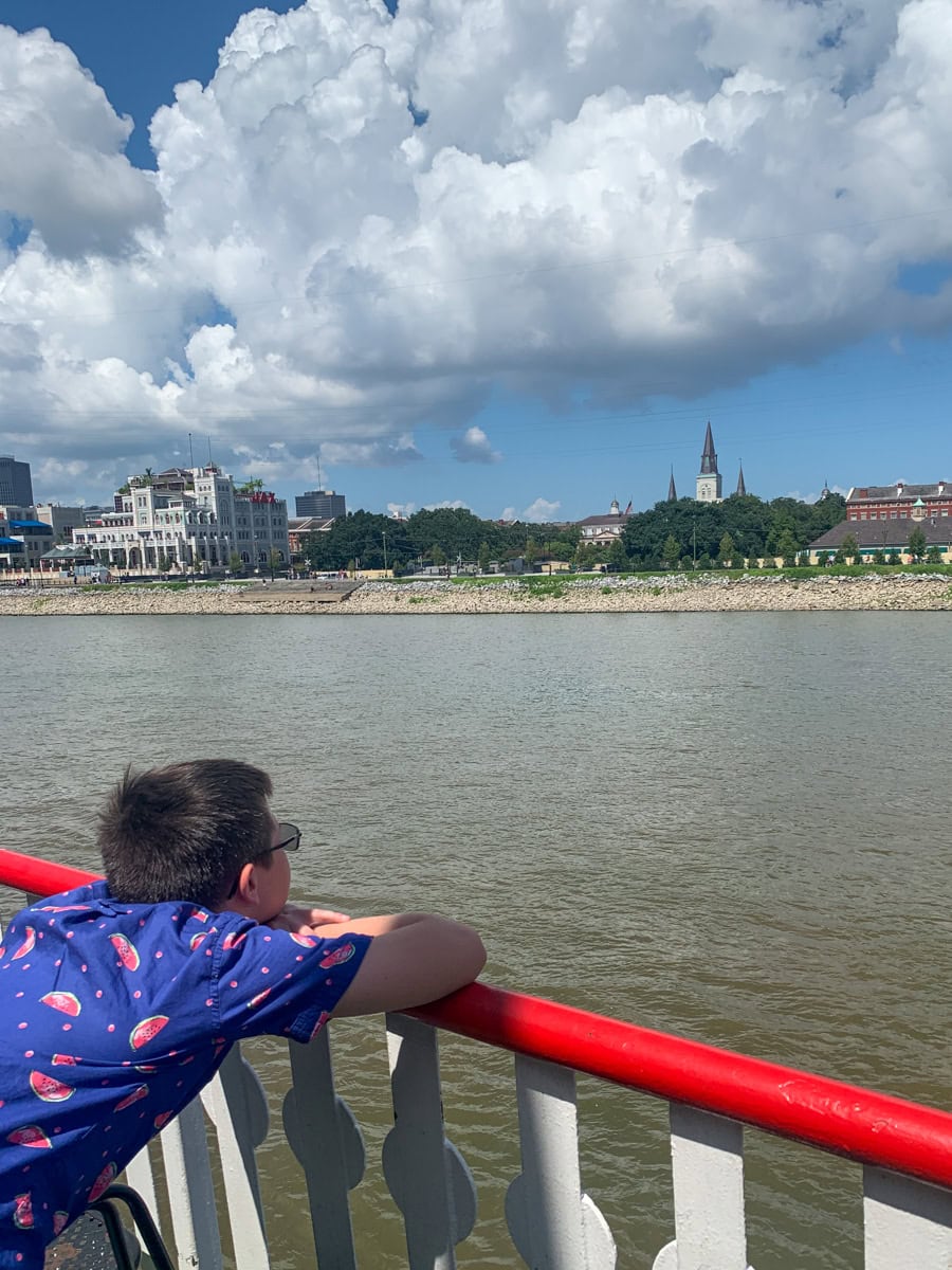 My son getting some fresh air on a paddleboat
