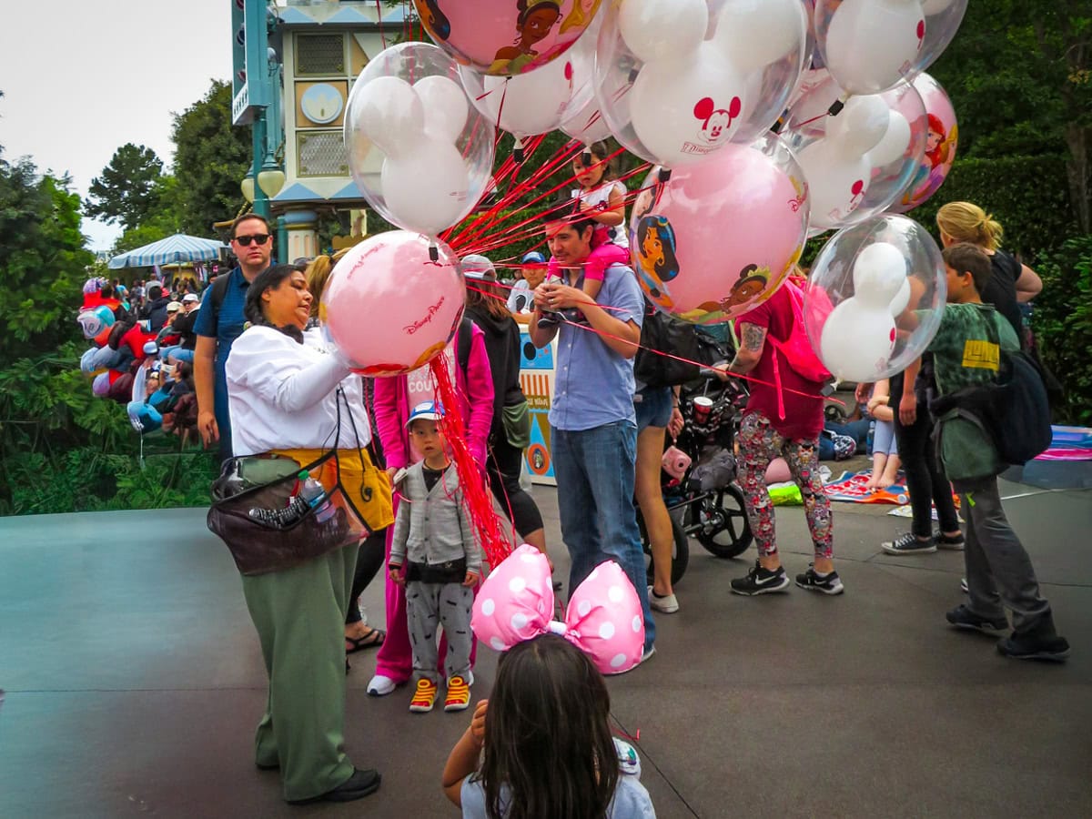 Balloons at Disneyland with kids