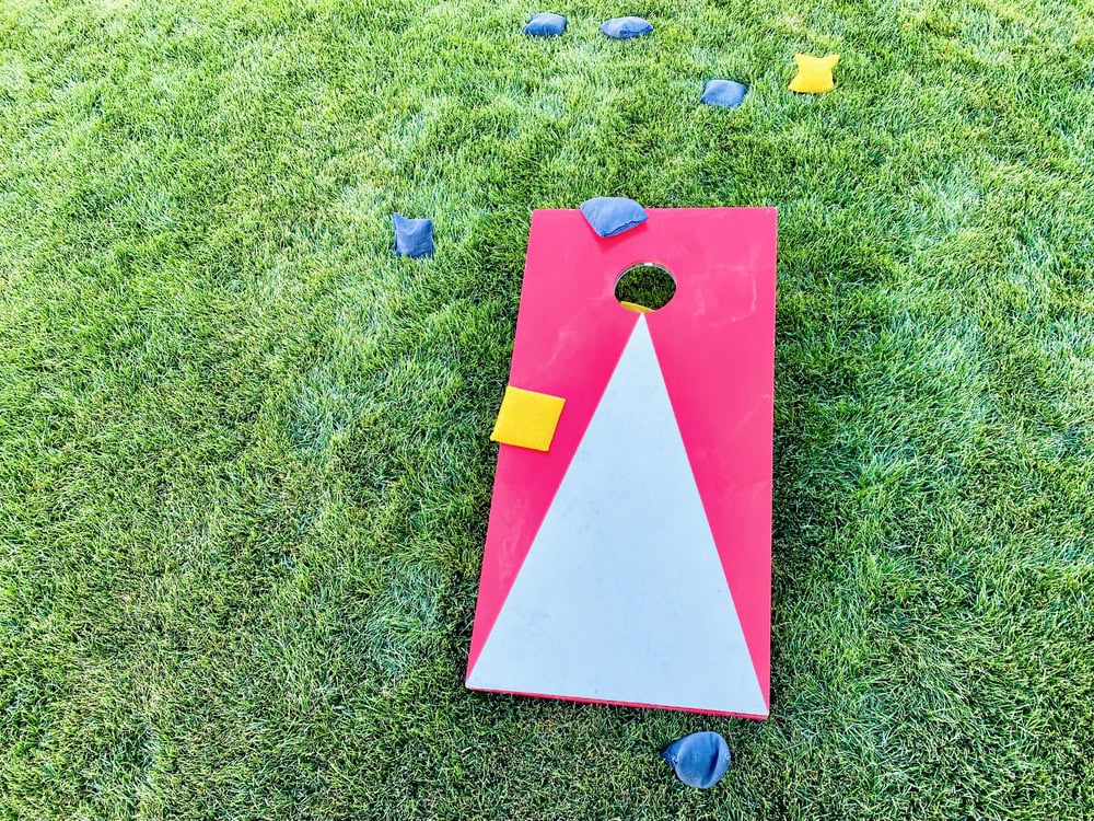 Set up yard games like cornhole