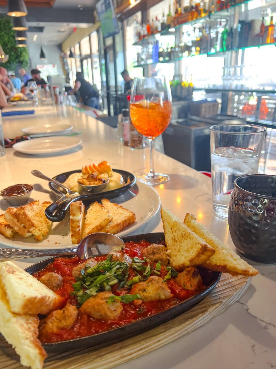 Happy hour Mama’s Meat-Za Balls and Baked Brie at Picazzo's in Scottsdale