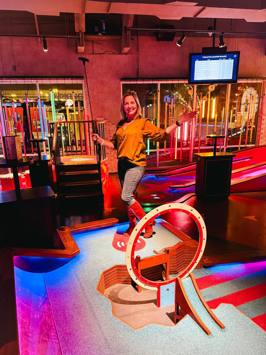 Colleen Lanin playing mini golf at Puttshack Scottsdale
