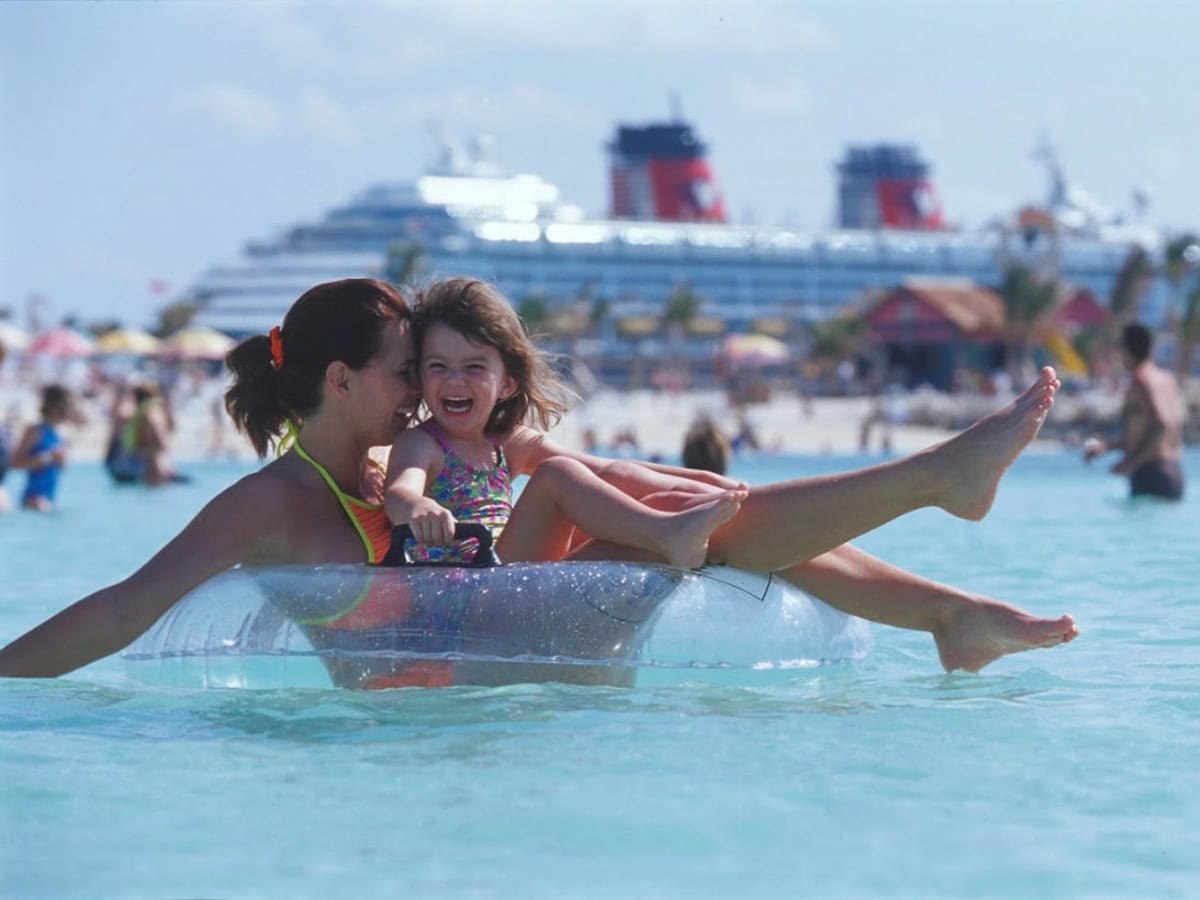 Mom and daughter in an inner tube float at Castaway Cay