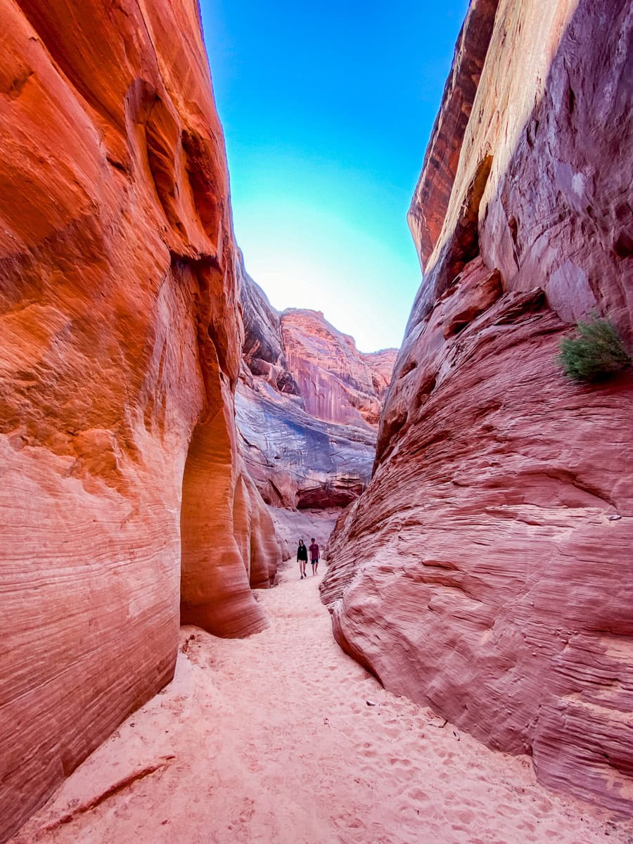 Kids hiking through Antelope Canyon, one of the best places to visit in Arizona